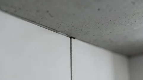 dylatacja ścian działowych od stropu